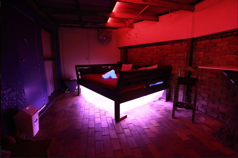 Bedroom of swinger club on the Gold Coast