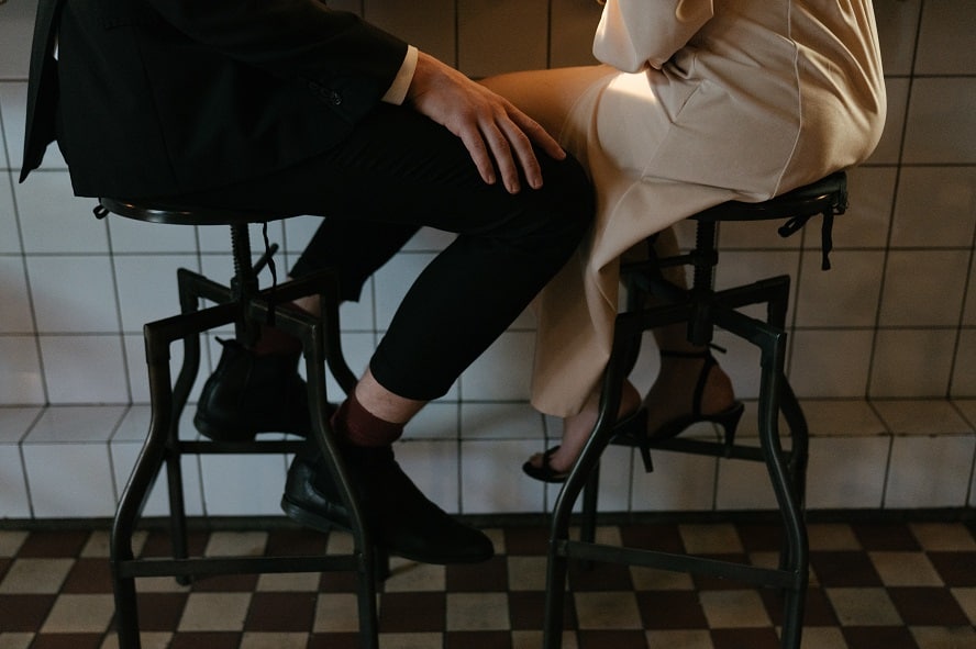 older man flirting with younger woman