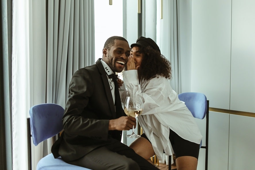 telling flirtatious stories and jokes 